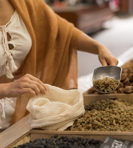 woman-taking-dried-food-at-market-place-sideways
